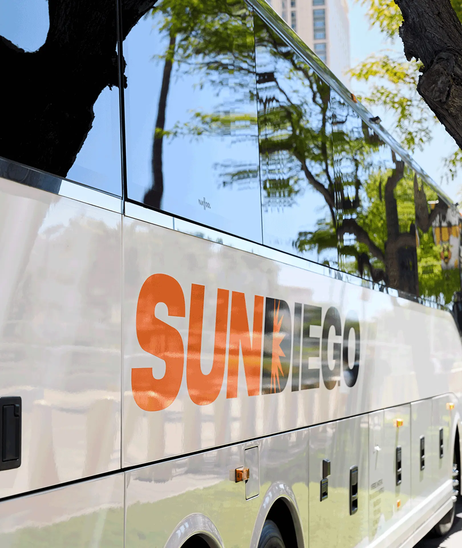 Sun Diego Charter branding on the side of a motorcoach