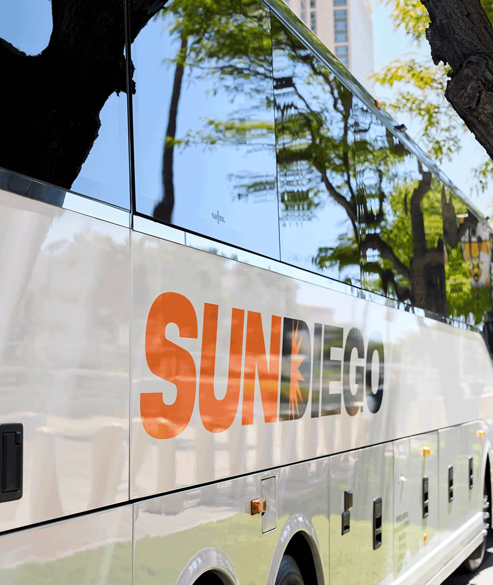 Sun Diego Charter branding on the side of a motorcoach